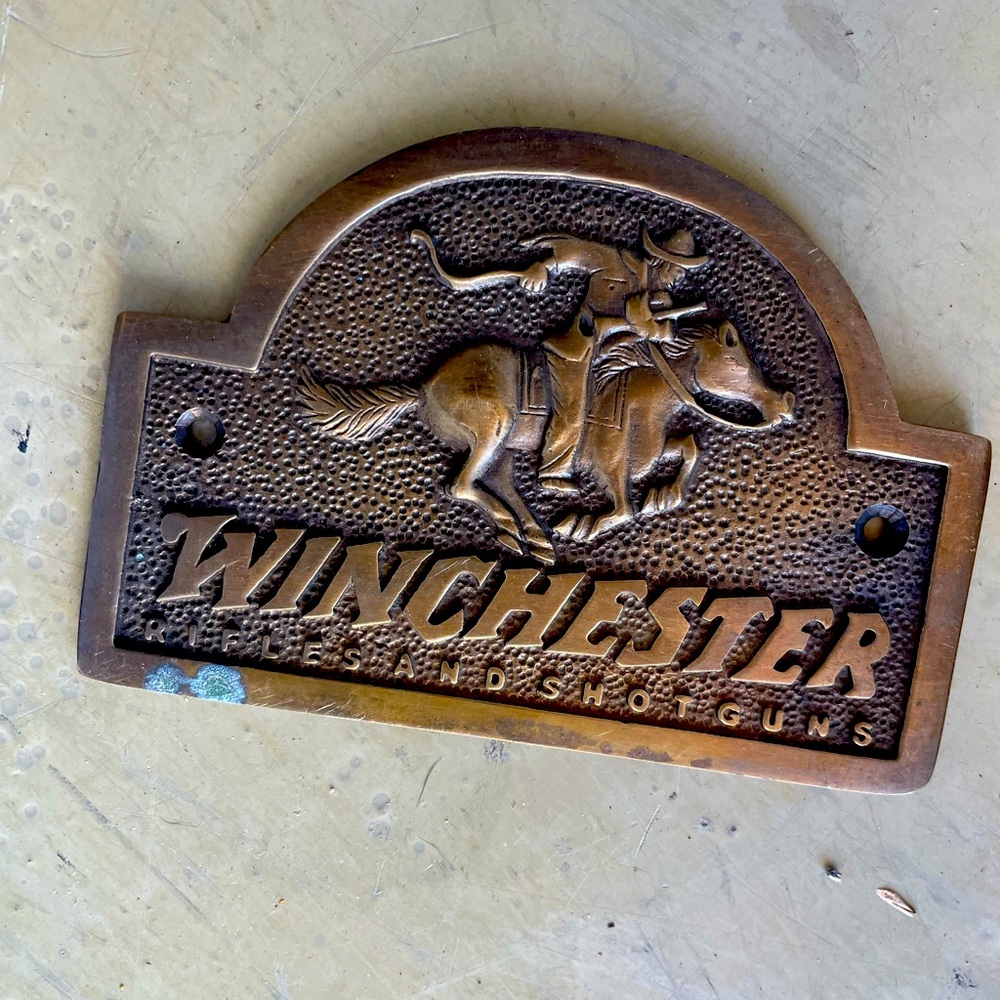 Winchester Rifles and Shotguns sign